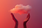 Handen en wolken in de roze lucht
